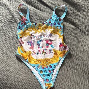 Versace women’s  Turquoise, White & Gold Baroque Logo One-Piece Swimsuit- NWT